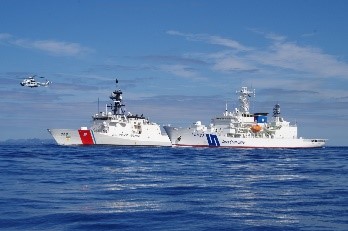 The JCG vessel Akitsushima and USCG cutter Kimball