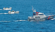 USCG�Ƃ̍����P��
